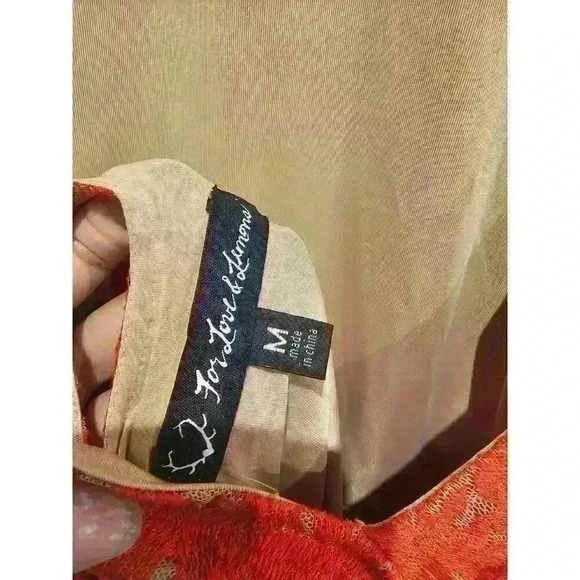 For Love and Lemons.
San Marcos Short Sleeve Open Back Dress. SZ Medium. - Picture 4 of 4